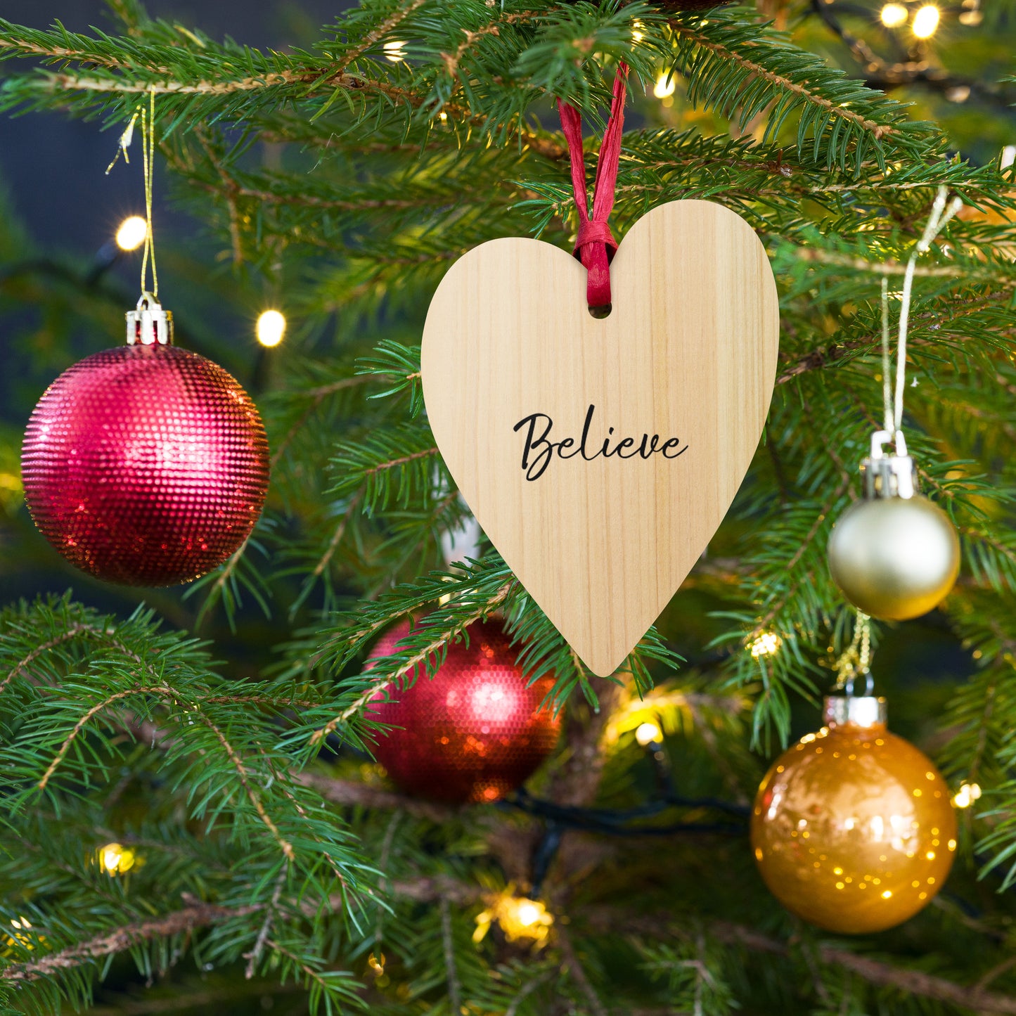 Wooden BELIEVE Christmas ornament